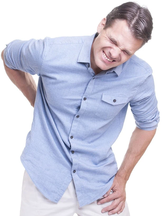 A man holding his lower back in pain