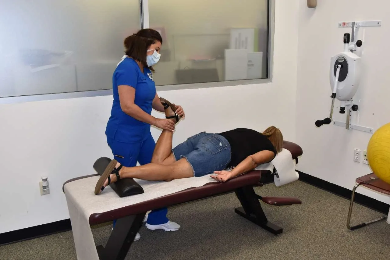A therapist working with a patient at Florida Wellness Center